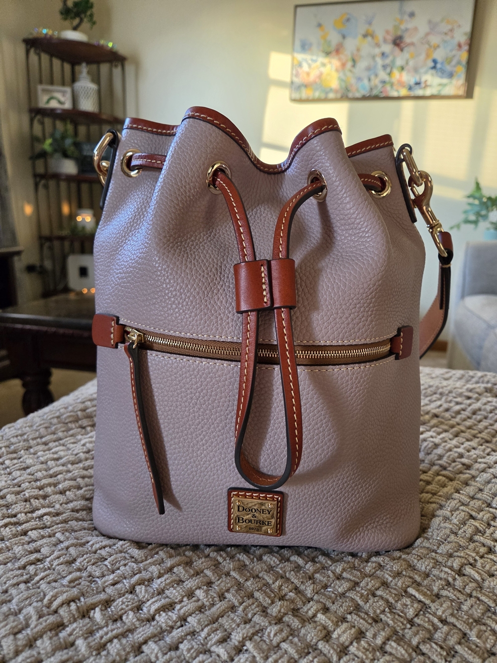 Dooney & Bourke Taupe Pebbled Leather Drawstring Bucket Bag with Brown Trim